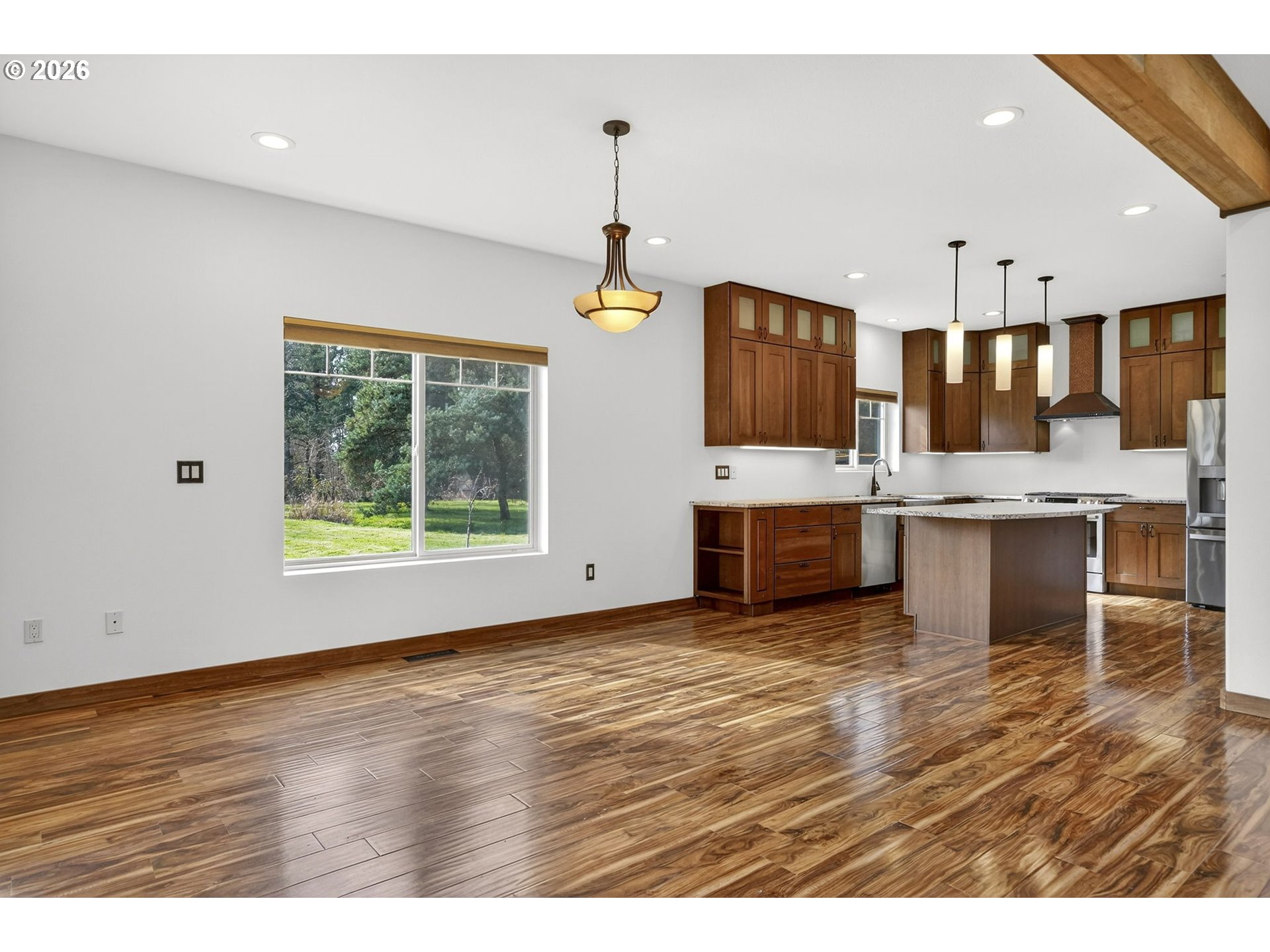 24677 Southeast Van Curen Road Eagle Creek, OR 97022 - Photo 9 of 48 a view of kitchen and kitchen with granite countertop window