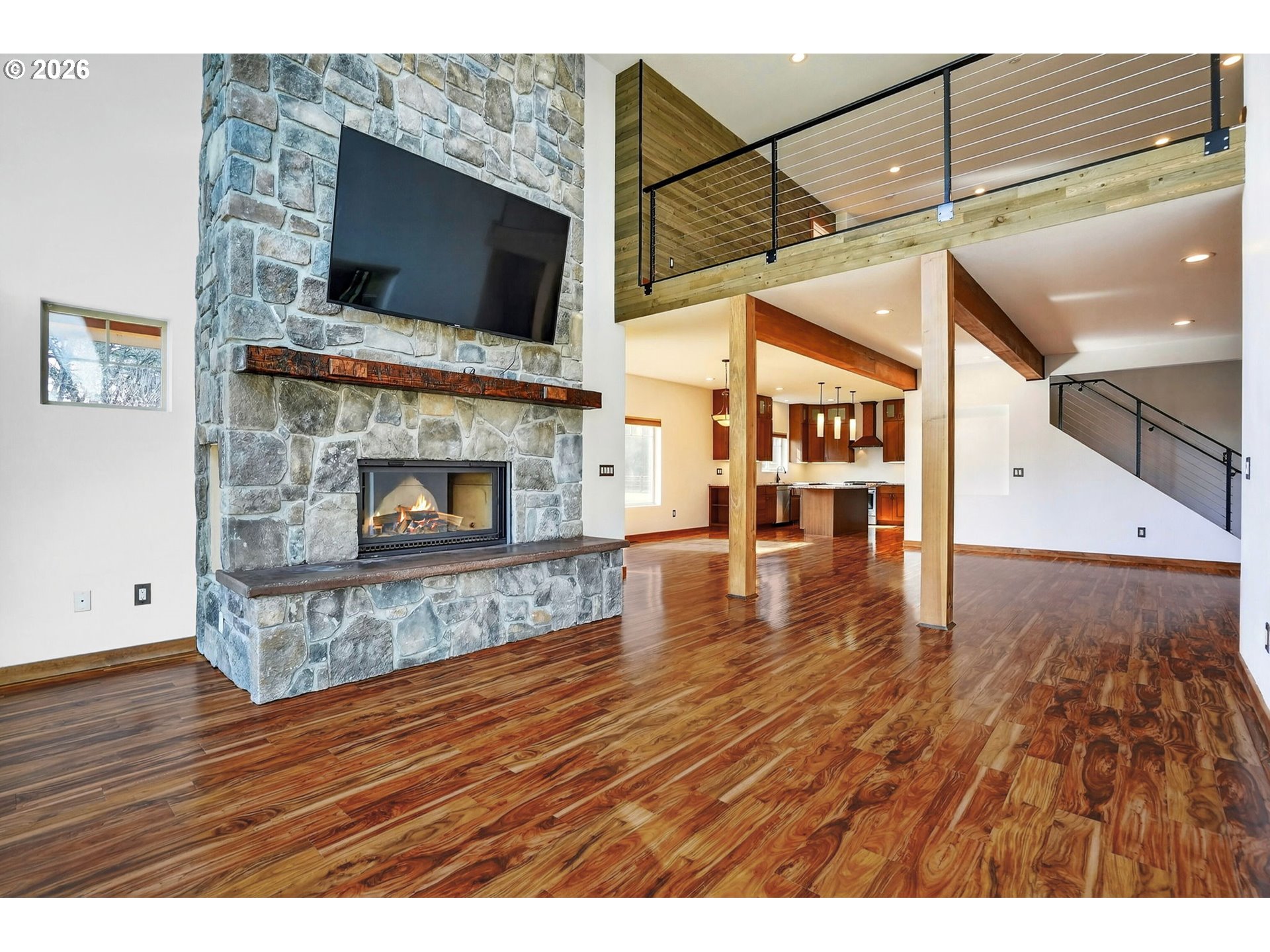 24677 Southeast Van Curen Road Eagle Creek, OR 97022 - Photo 10 of 48 a view of empty room with wooden floor and fireplace
