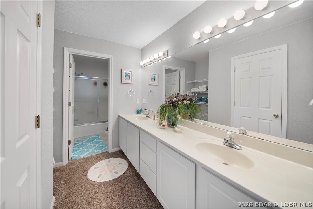 40 Lighthouse Road, Unit 301 Lake Ozark, MO 65049 - Photo 19 of 32 Double vanity in Master Bath