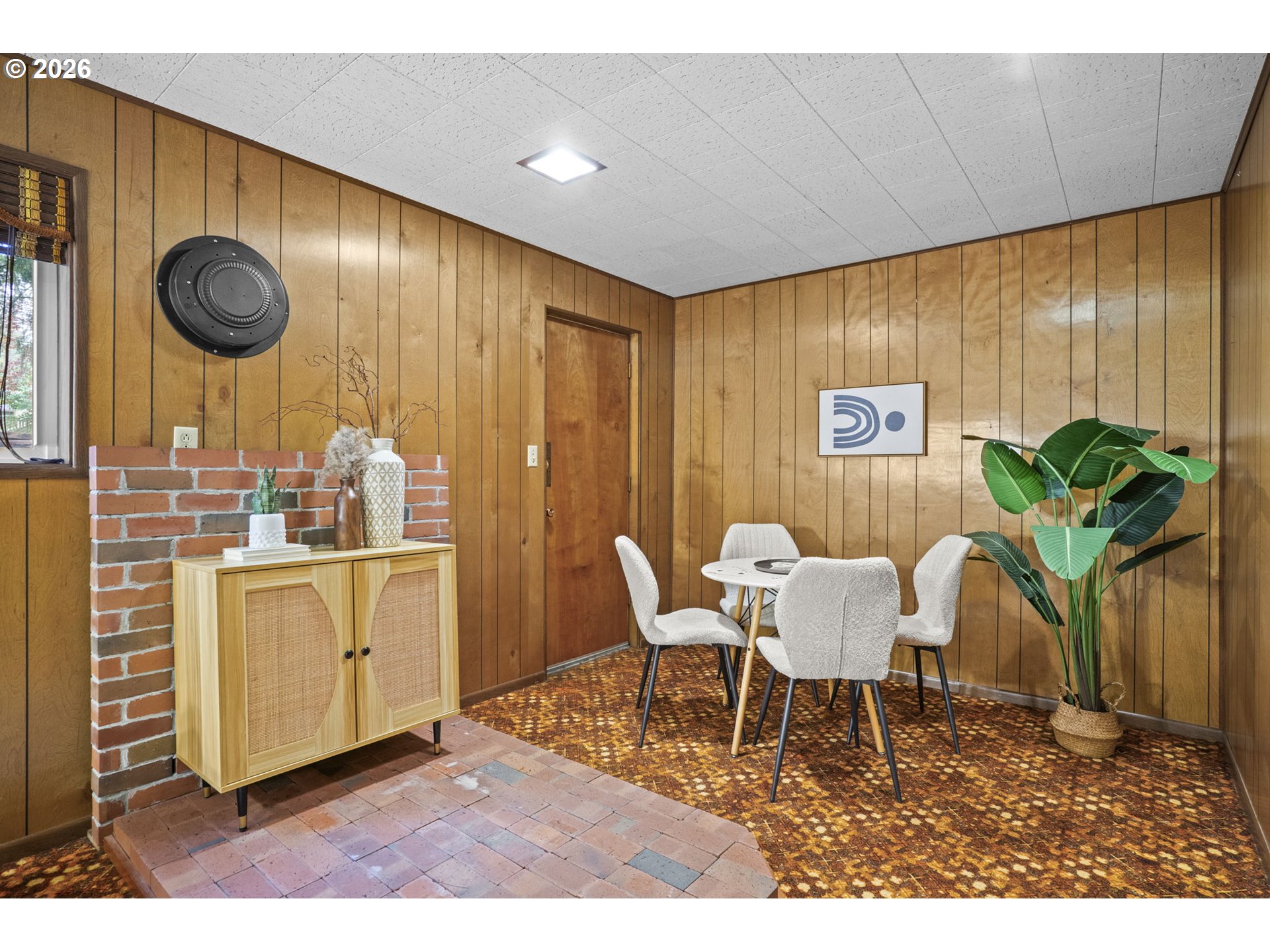 10531 Southeast Long Street Portland, OR 97266 - Photo 29 of 42 a dining room with furniture and window