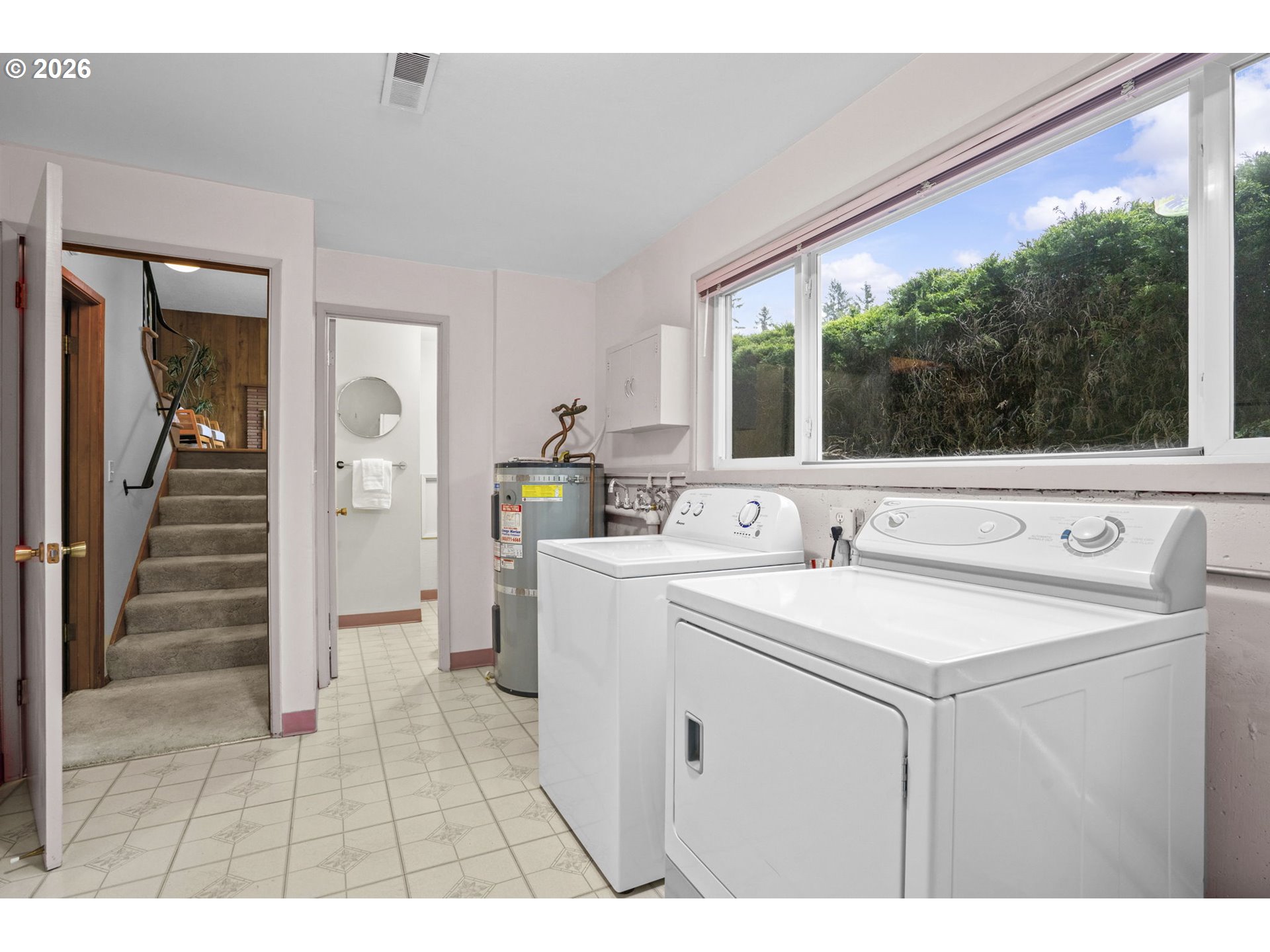 10531 Southeast Long Street Portland, OR 97266 - Photo 31 of 42 a view of bathroom with dual sinks