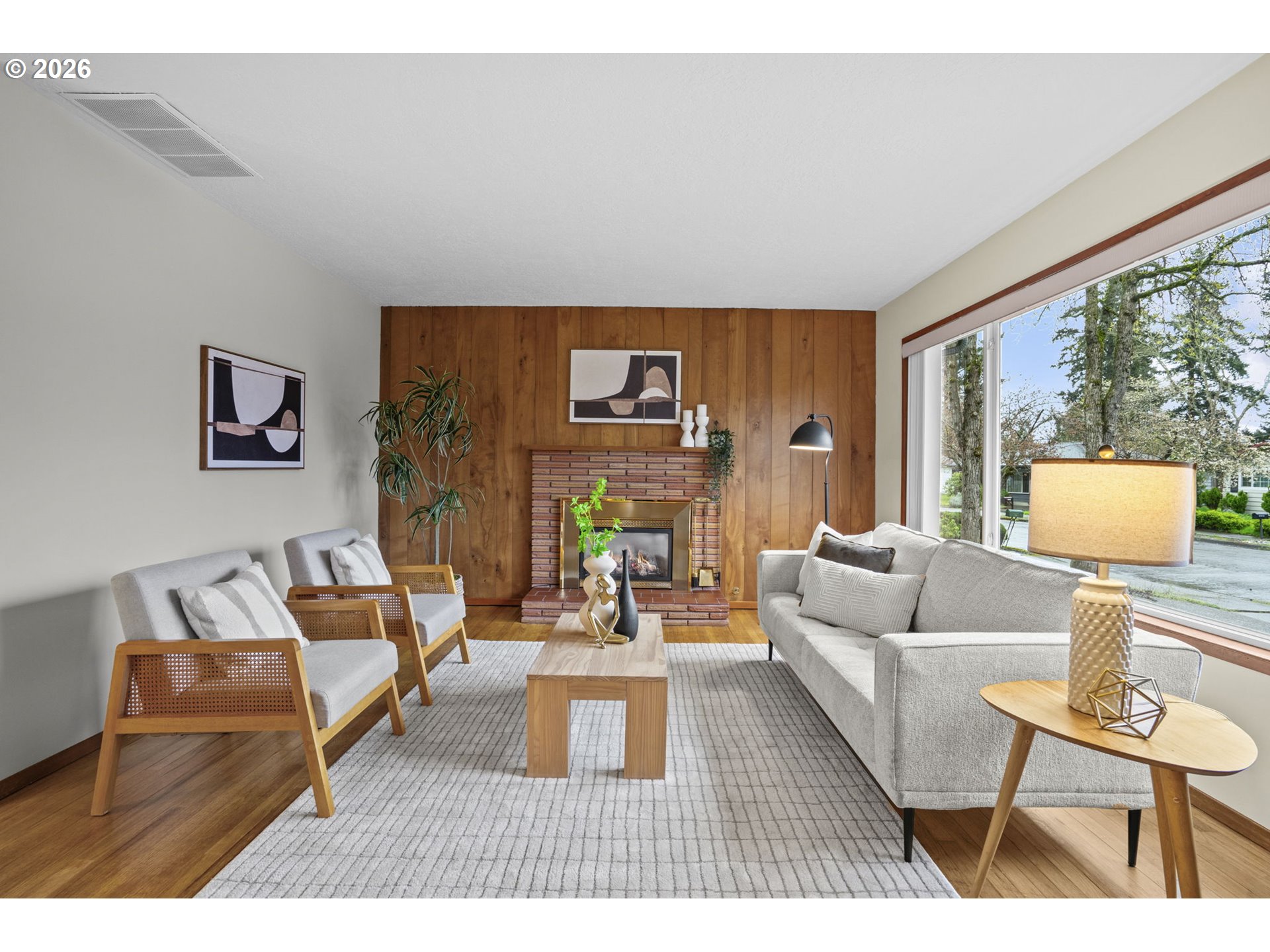 10531 Southeast Long Street Portland, OR 97266 - Photo 5 of 42 a living room with furniture and a lamp