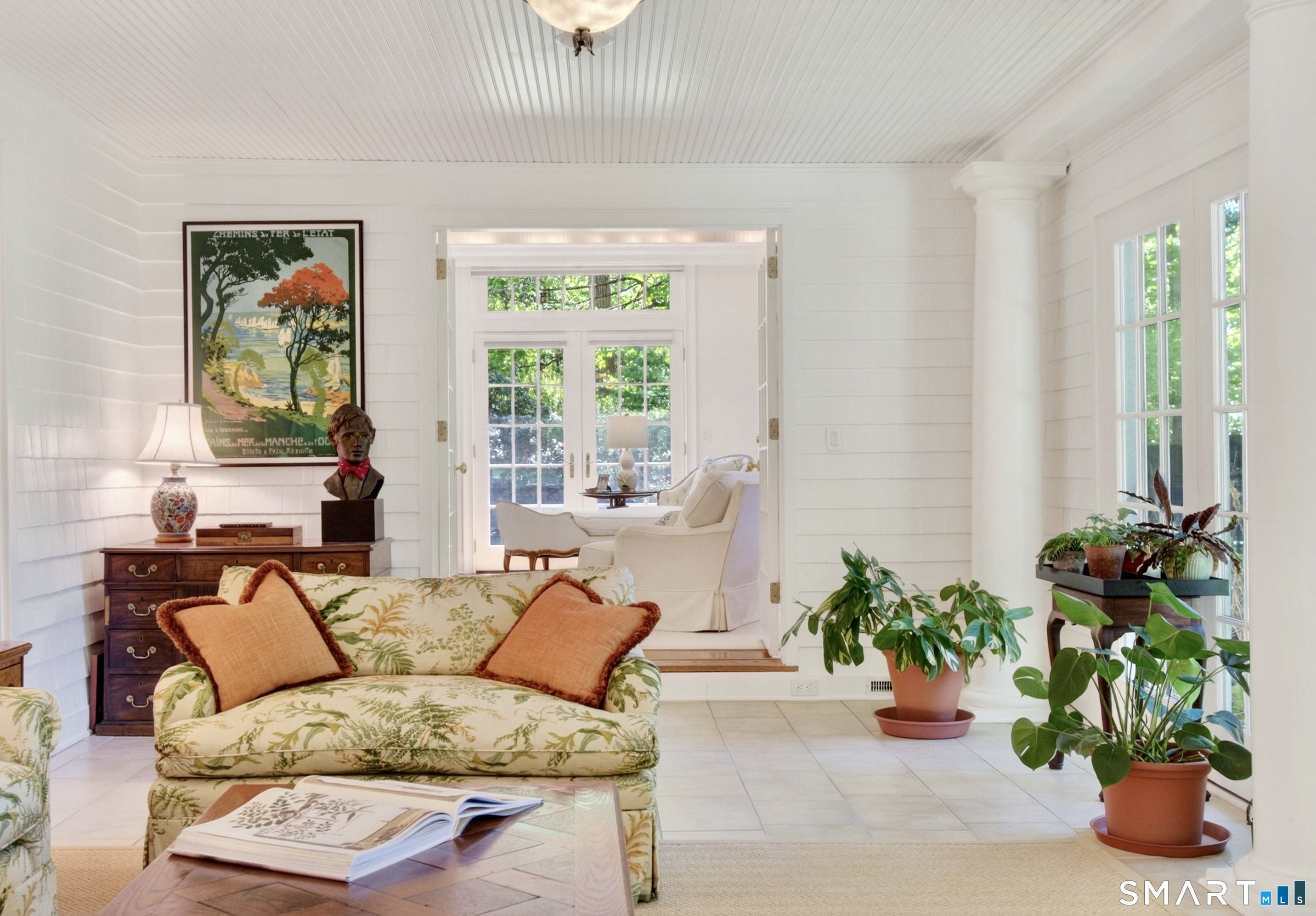 41 Peaceable Street Ridgefield, CT 06877 - Photo 11 of 40 a living room with furniture potted plant and window