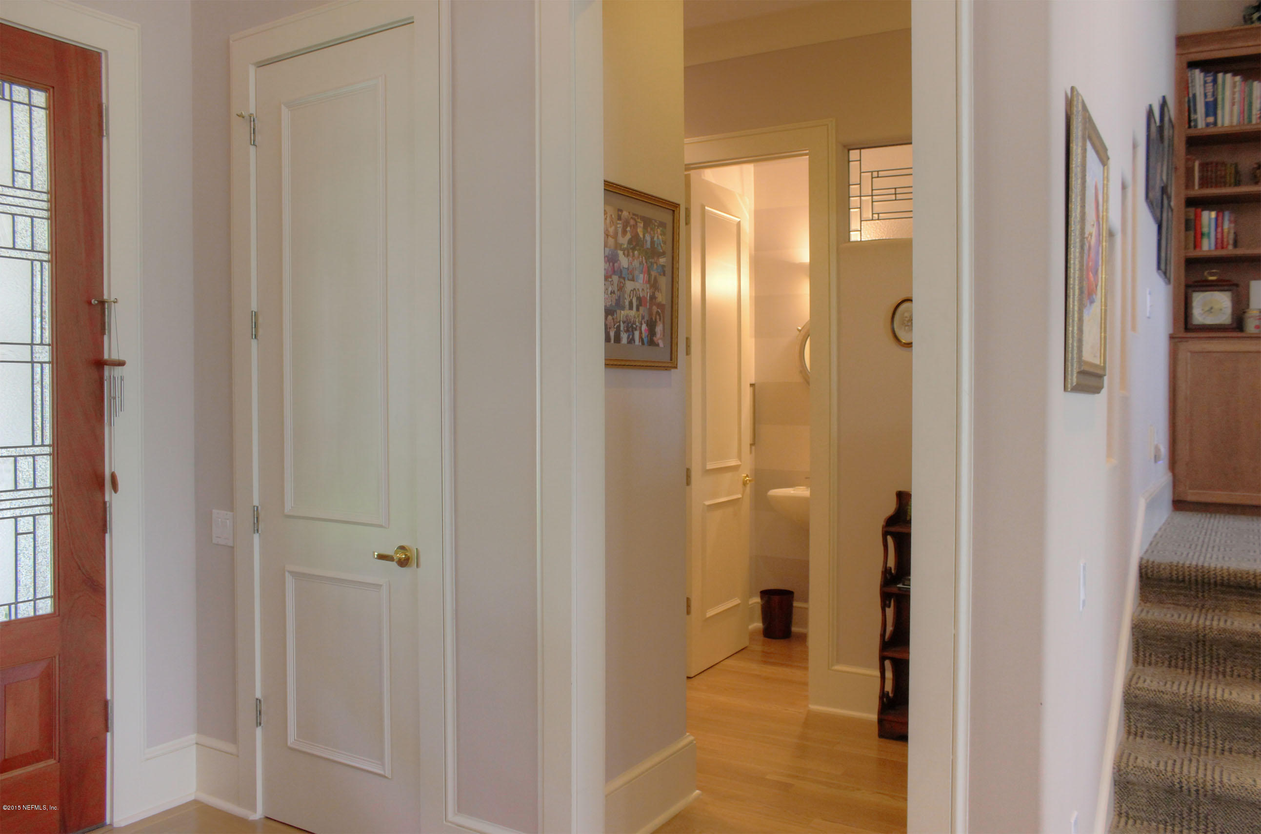 22 Sea Marsh Road Fernandina Beach, FL 32034 - Photo 14 of 24 a view of a bathroom from the hallway