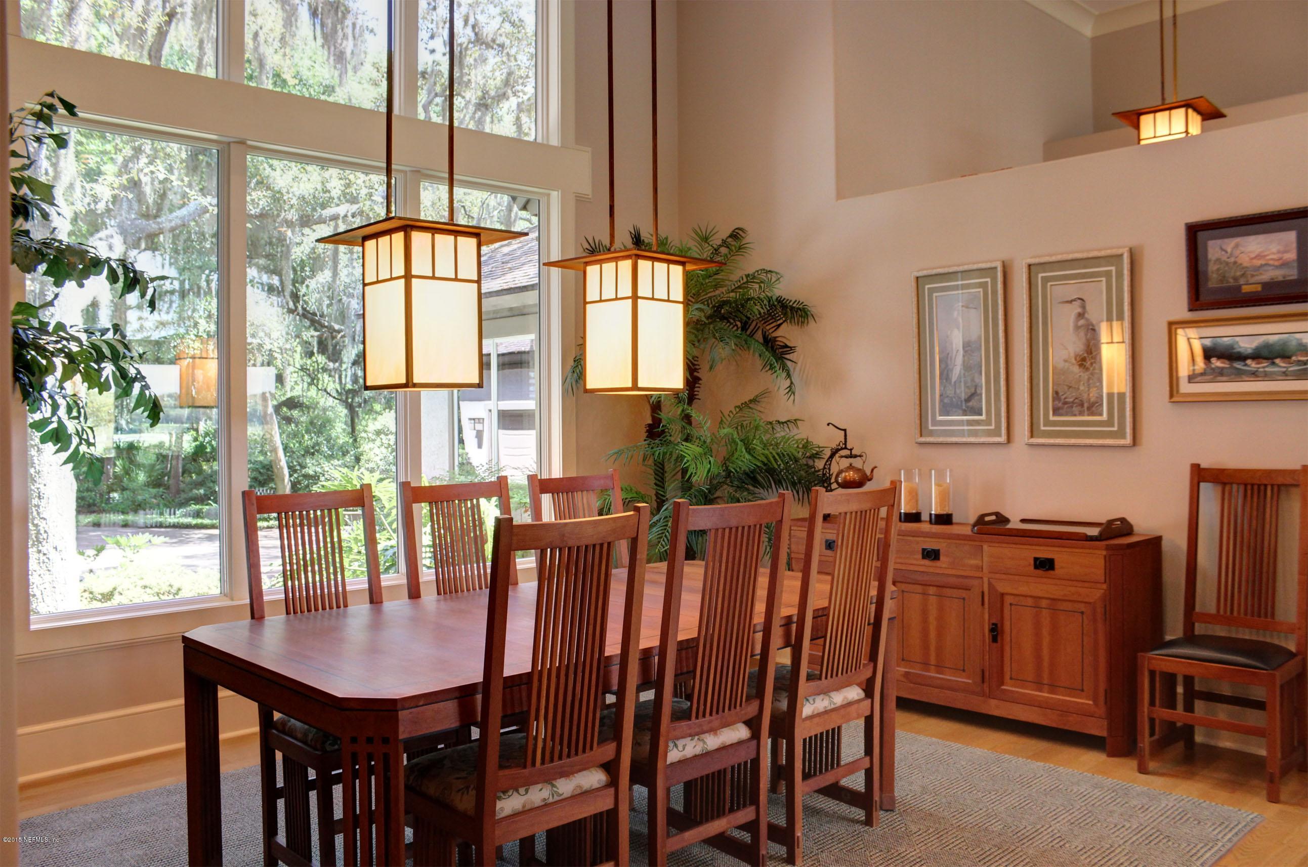 22 Sea Marsh Road Fernandina Beach, FL 32034 - Photo 6 of 24 a view of a dining room with furniture window and outside view
