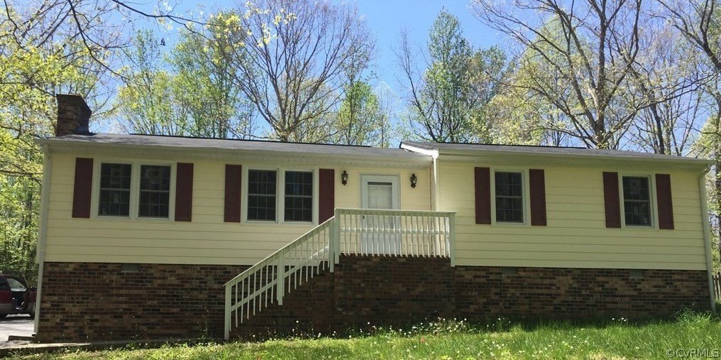 a house that has a large tree in it