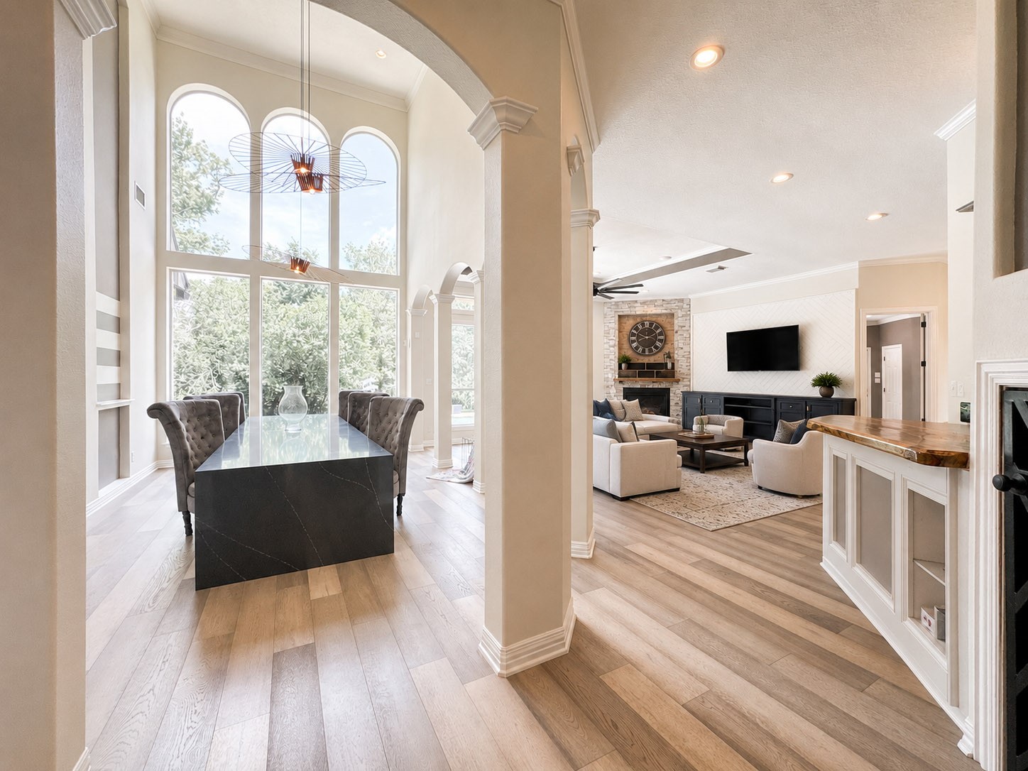 1810 Woerner Road Houston, TX 77090 - Photo 16 of 39 Experience luxury in this spacious living area, featuring soaring ceilings, abundant natural light, and elegant hardwood floors. Perfect for entertaining or relaxing.