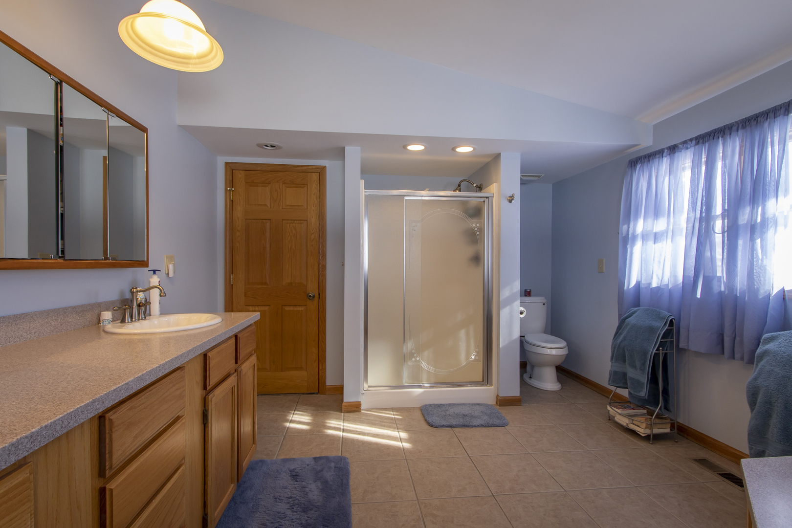 6546 Cherry Valley Road Kingston, IL 60145 - Photo 17 of 51 a bathroom with a sink and a mirror