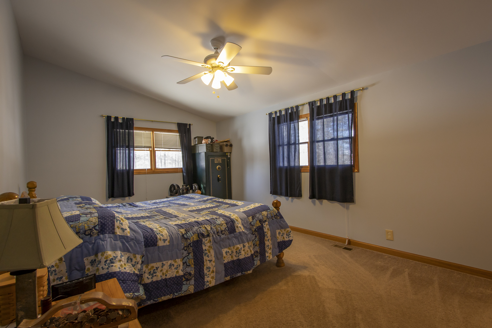 6546 Cherry Valley Road Kingston, IL 60145 - Photo 18 of 51 a bedroom with a bed table and window