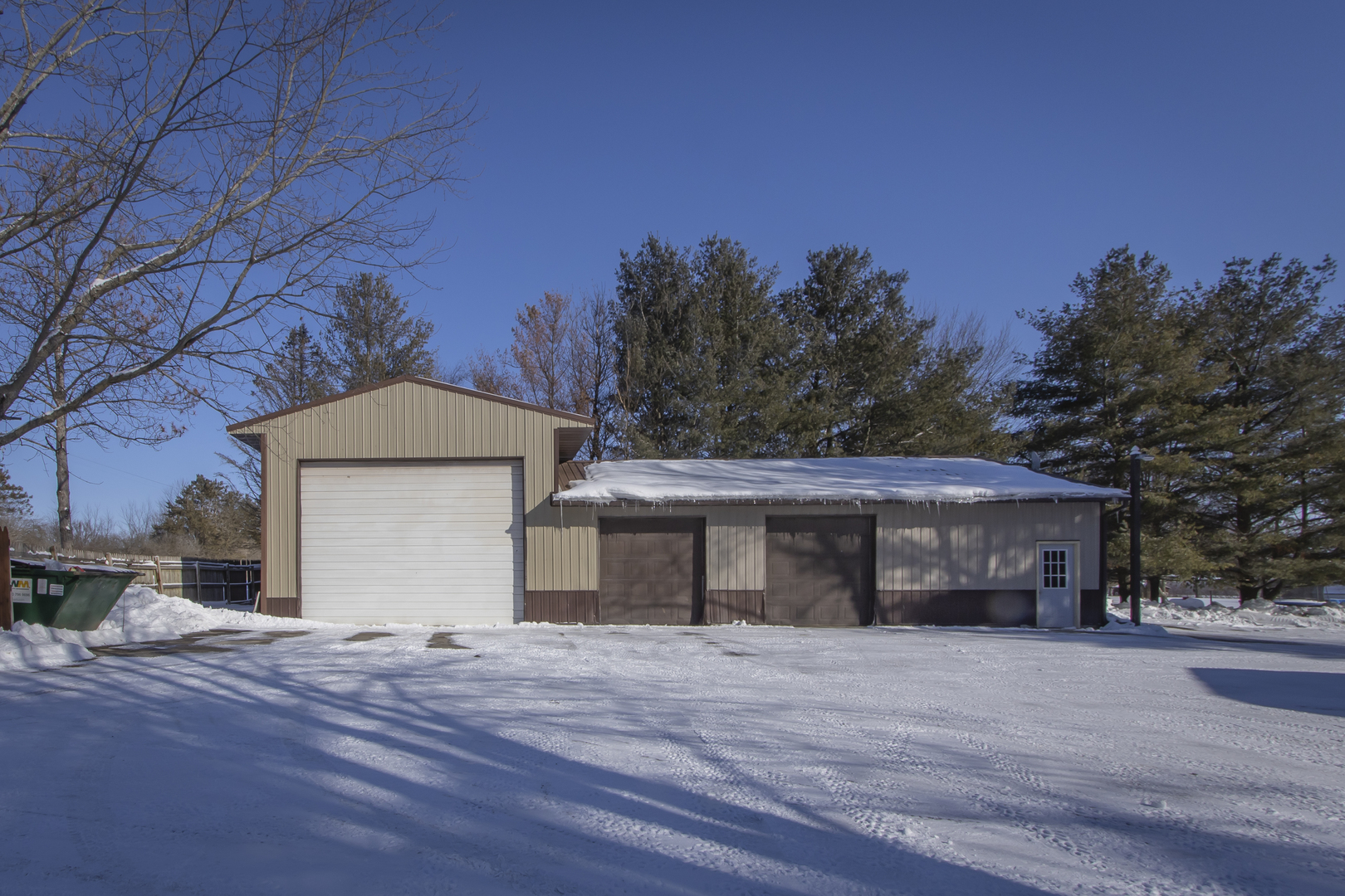 6546 Cherry Valley Road Kingston, IL 60145 - Photo 3 of 51 a front view of a house with a yard and trees