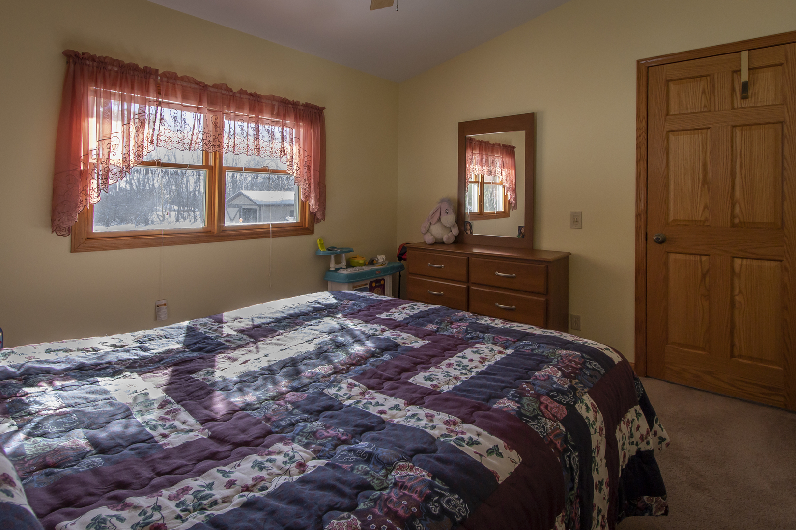 6546 Cherry Valley Road Kingston, IL 60145 - Photo 23 of 51 a bedroom with a bed and a window