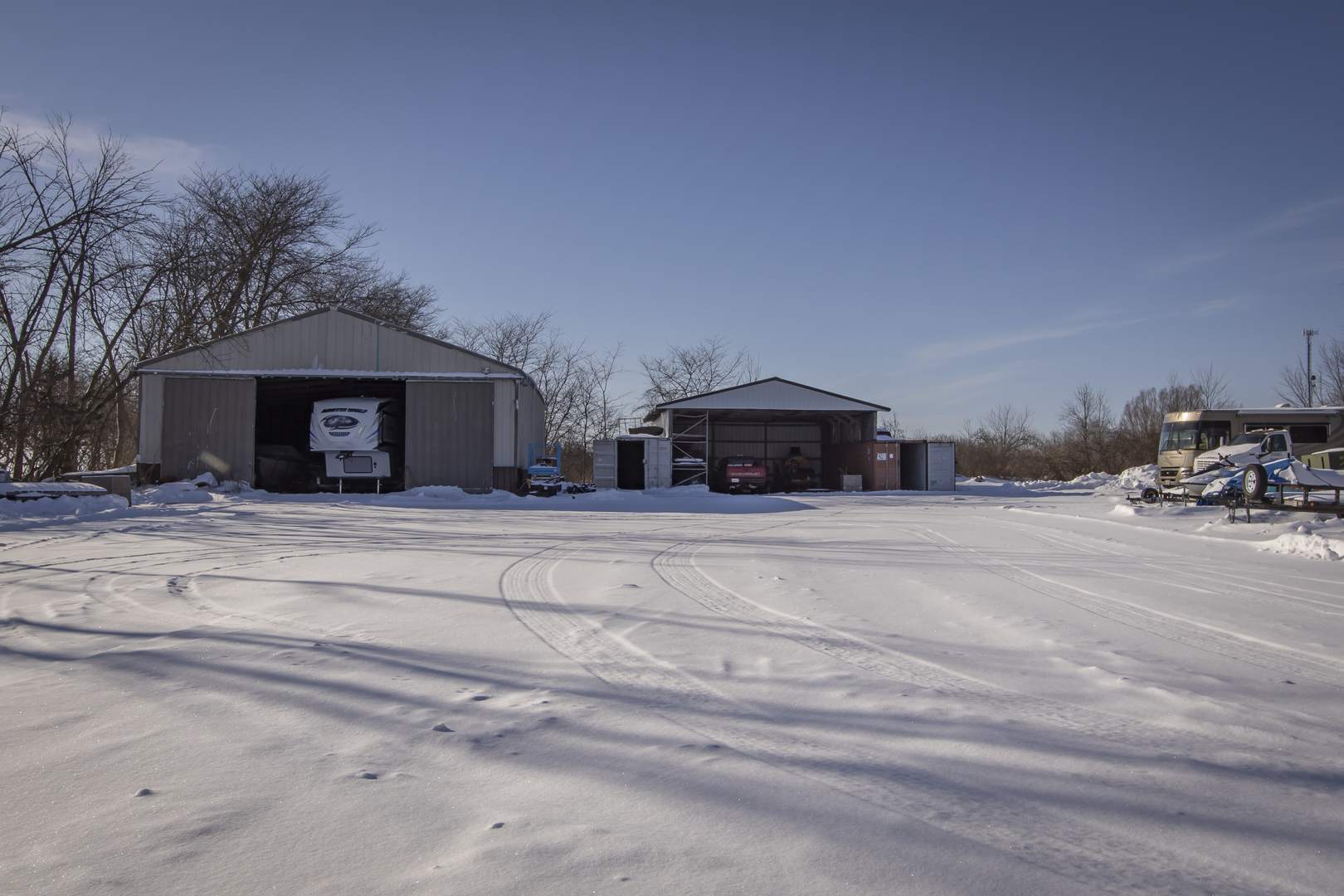 6546 Cherry Valley Road Kingston, IL 60145 - Photo 41 of 51 a front view of a house with cars parked