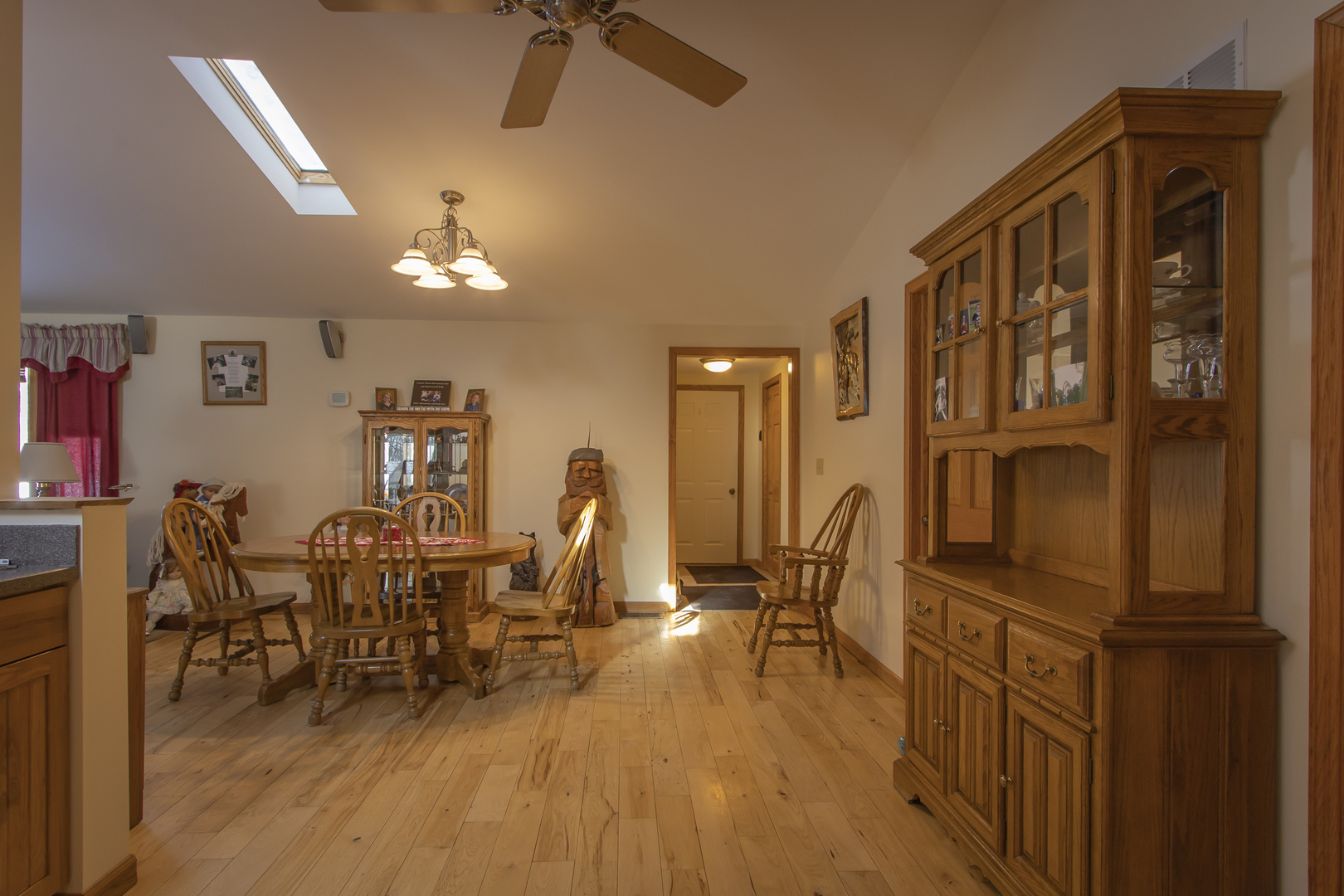 6546 Cherry Valley Road Kingston, IL 60145 - Photo 7 of 51 a view of a dining room with furniture window and wooden floor