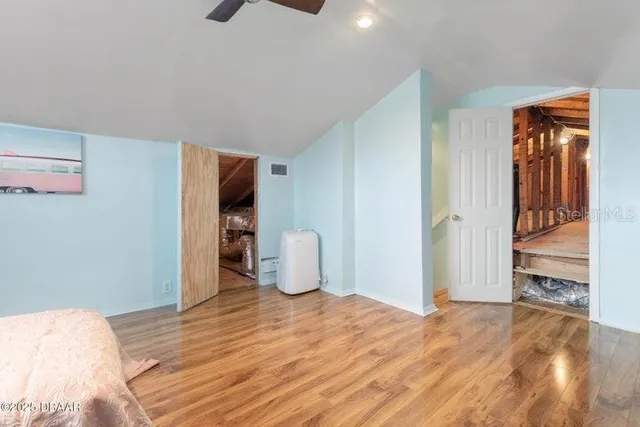 a room that has a bed and closet