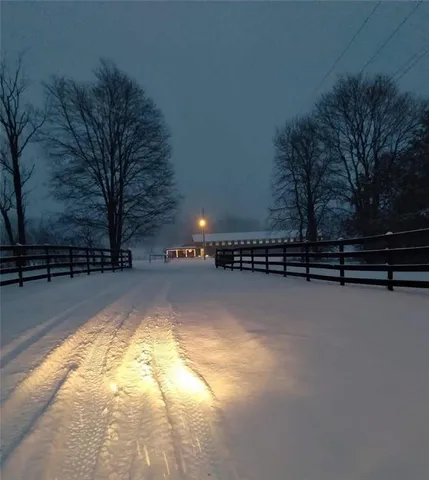 a view of swimming pool with outdoor seating
