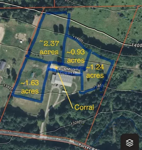 a sign broad on a pole on a street