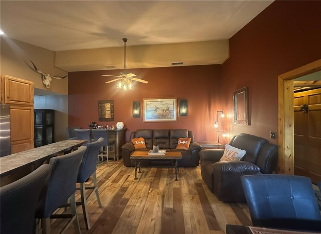 1316 Porter Road Harrisville, PA 16038 - Photo 6 of 37 a living room with furniture and a chandelier