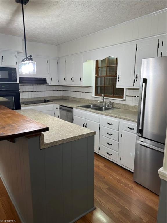 173 Junction Road Mocksville, NC 27028 - Photo 8 of 23 New paint, new light fixture. Newly painted cabinets with black hinges and pulls