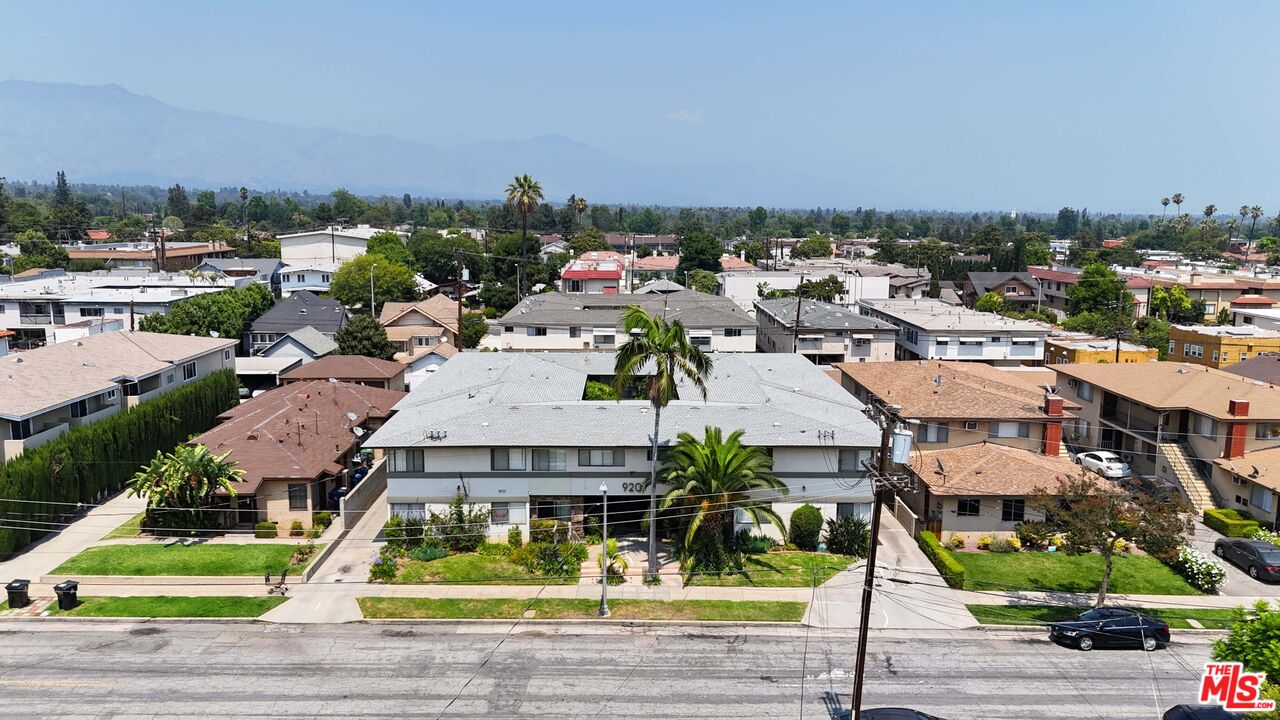 920 North 1st Street Alhambra, CA 91801 - Photo 4 of 22 an aerial view of a residential houses with yard and mountain view in back
