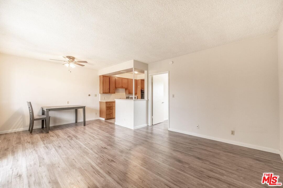 920 North 1st Street Alhambra, CA 91801 - Photo 8 of 22 a view of a kitchen with a sink and a refrigerator