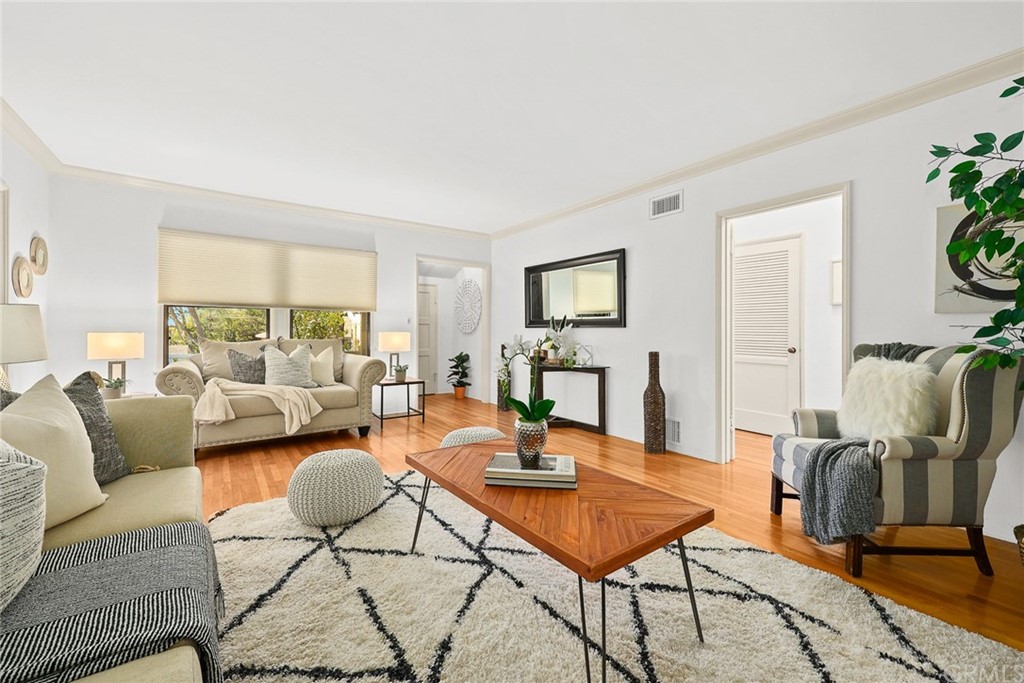 1183 Menlo Drive Altadena, CA 91001 - Photo 8 of 34 a living room with furniture and a wooden floor
