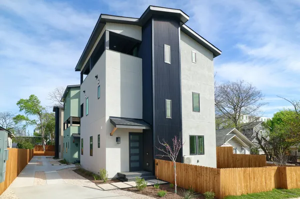 a front view of a house with street