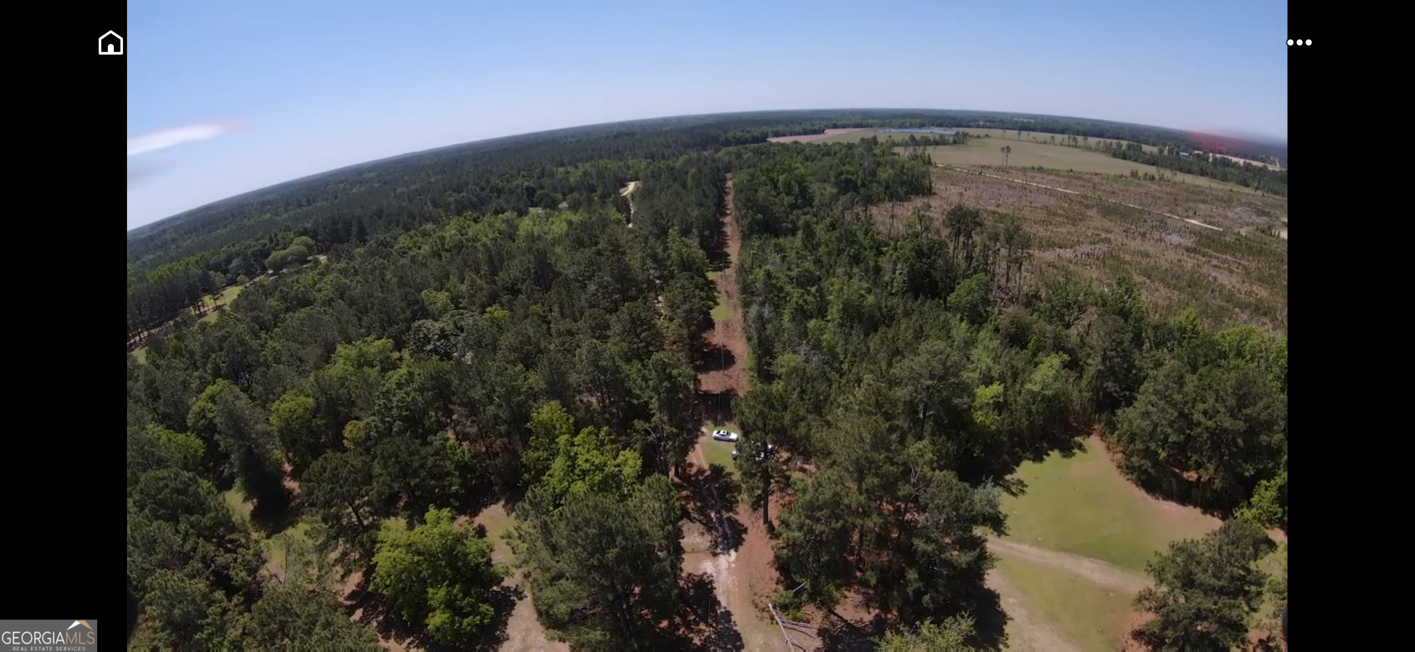0 Windwood Road Metter, GA 30439 - Photo 6 of 7 a view of a houses of a yard and mountain