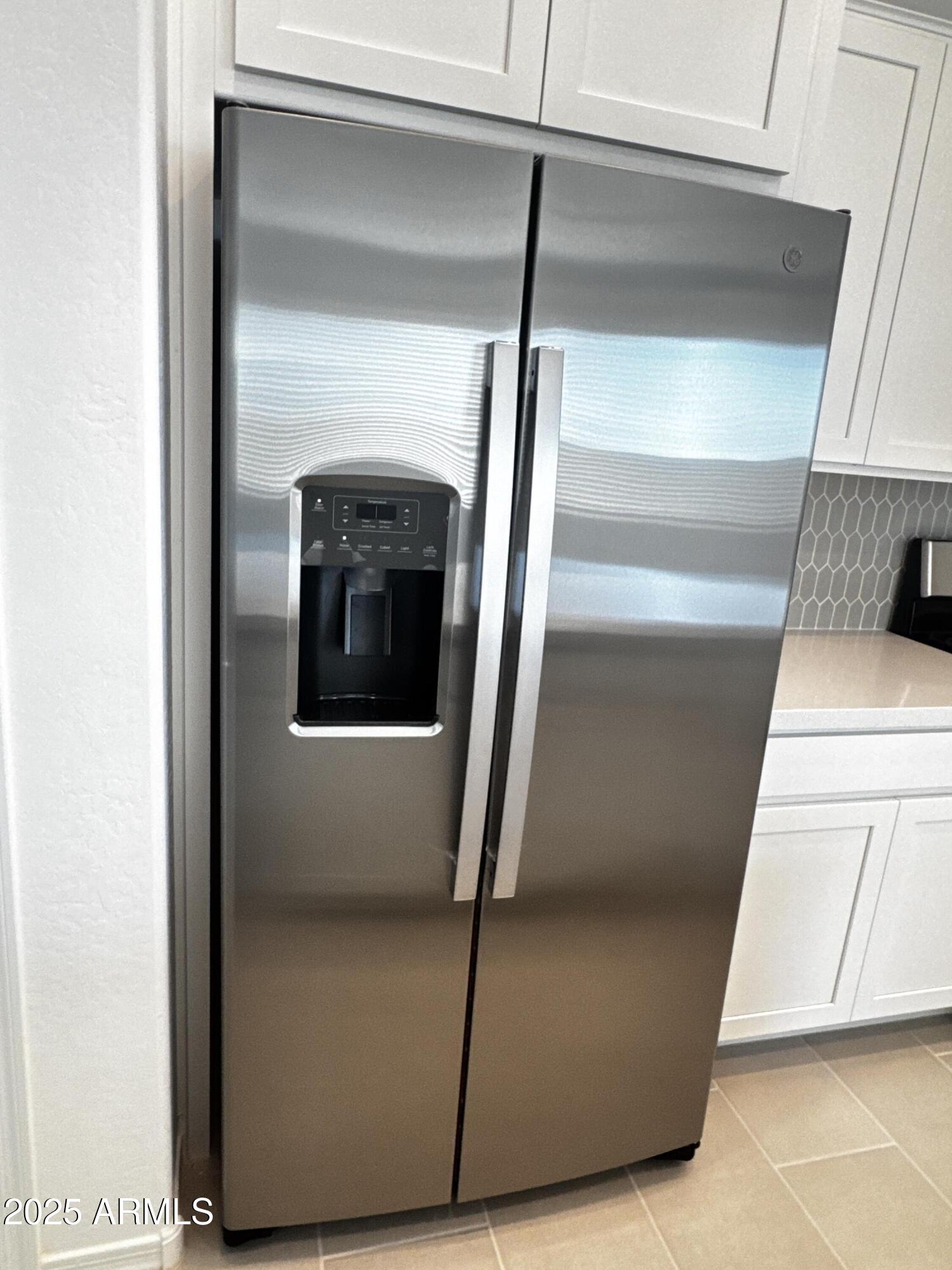 9957 West Mitchell Avenue Avondale, AZ 85392 - Photo 10 of 19 a view of a garage