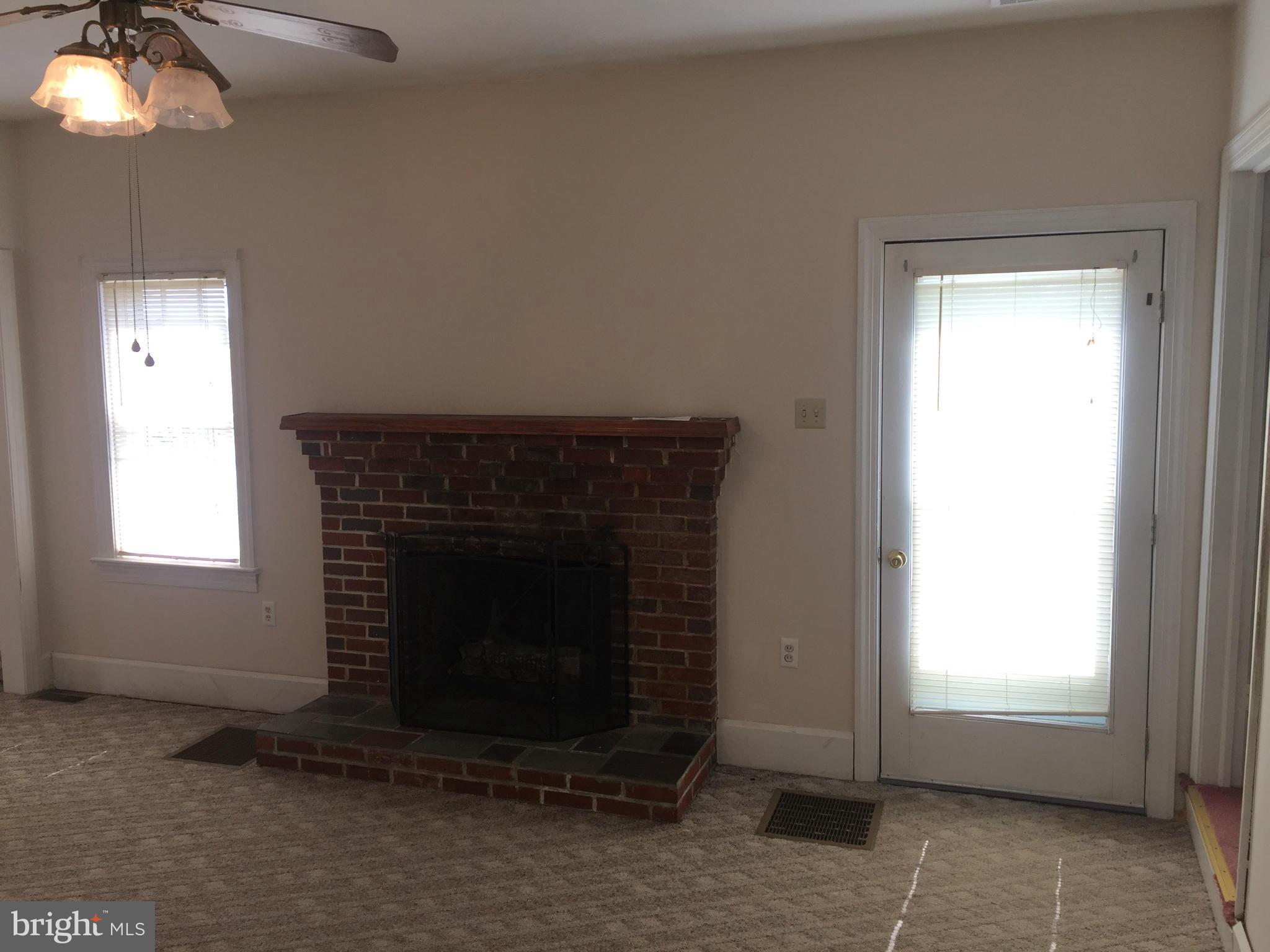 251 Christmas Tree Lane, Unit 103 Stephenson, VA 22656 - Photo 15 of 29 Fireplace Living Rm