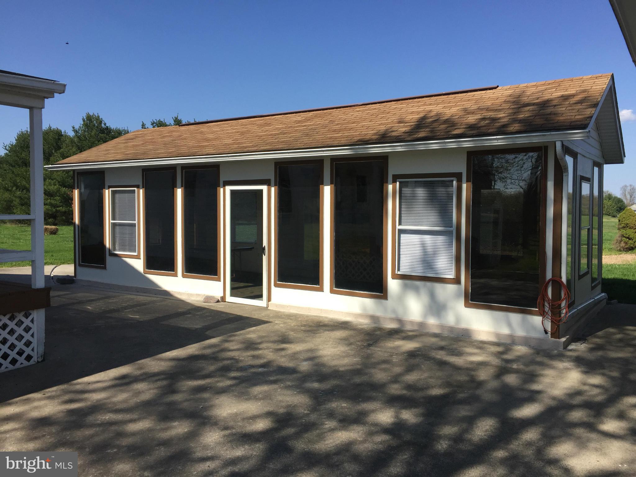 251 Christmas Tree Lane, Unit 103 Stephenson, VA 22656 - Photo 8 of 29 Self Standing Sun Rm/Gathering Building