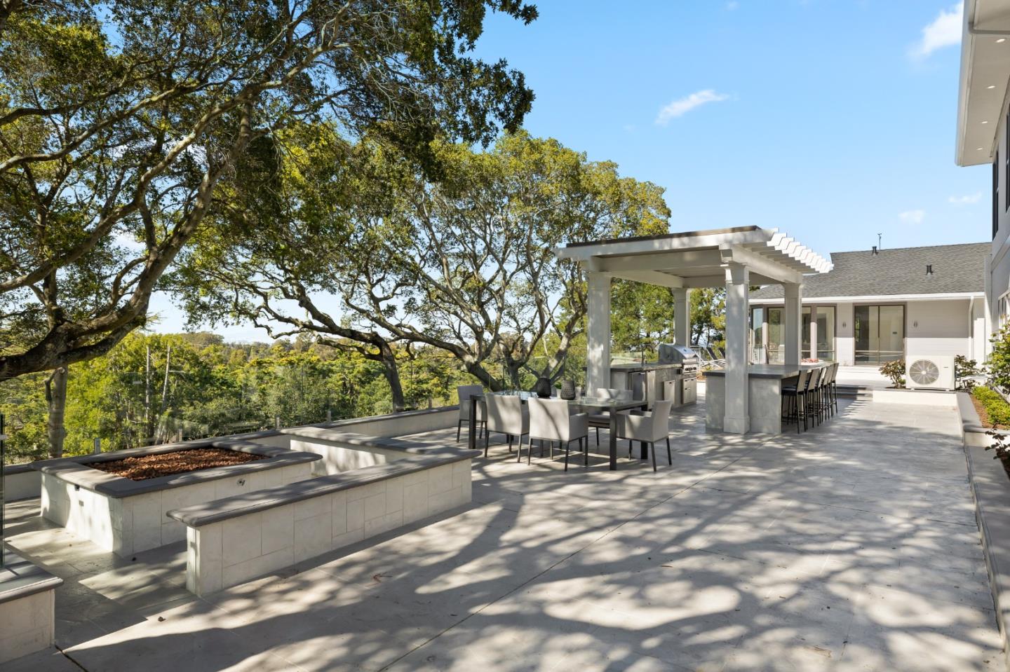 245 Eucalyptus Avenue Hillsborough, CA 94010 - Photo 11 of 27 a view of a park with bench and trees