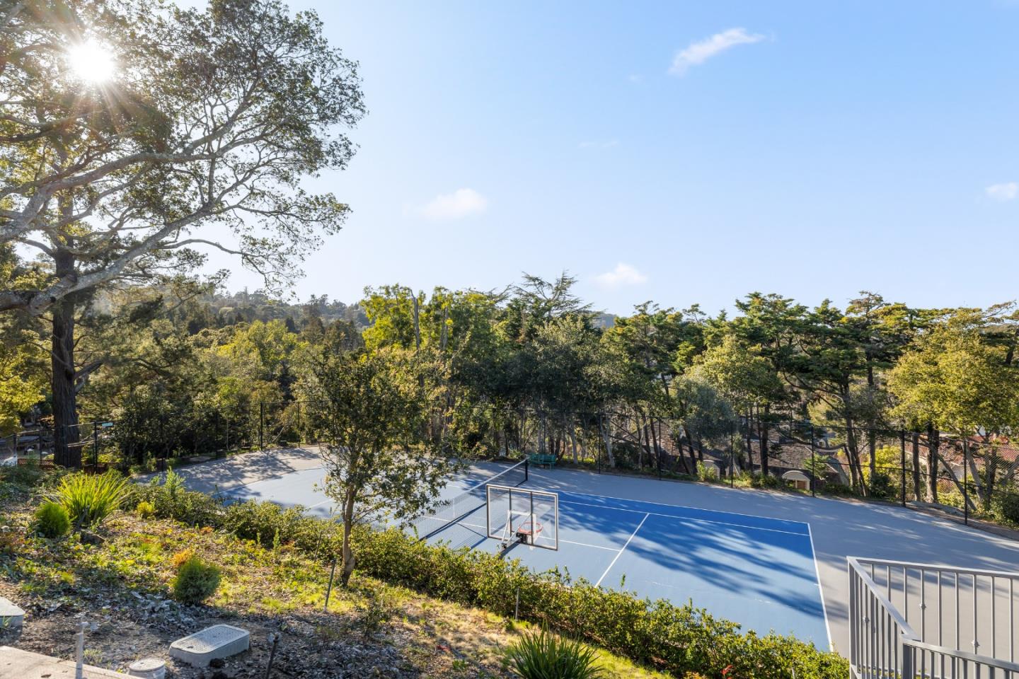 245 Eucalyptus Avenue Hillsborough, CA 94010 - Photo 19 of 27 a view of a yard with wooden fence