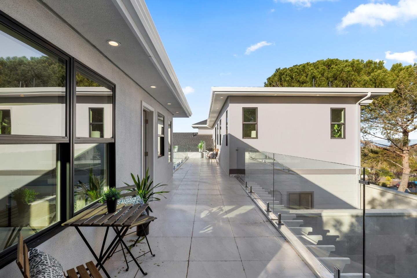 245 Eucalyptus Avenue Hillsborough, CA 94010 - Photo 21 of 27 a porch with seating space