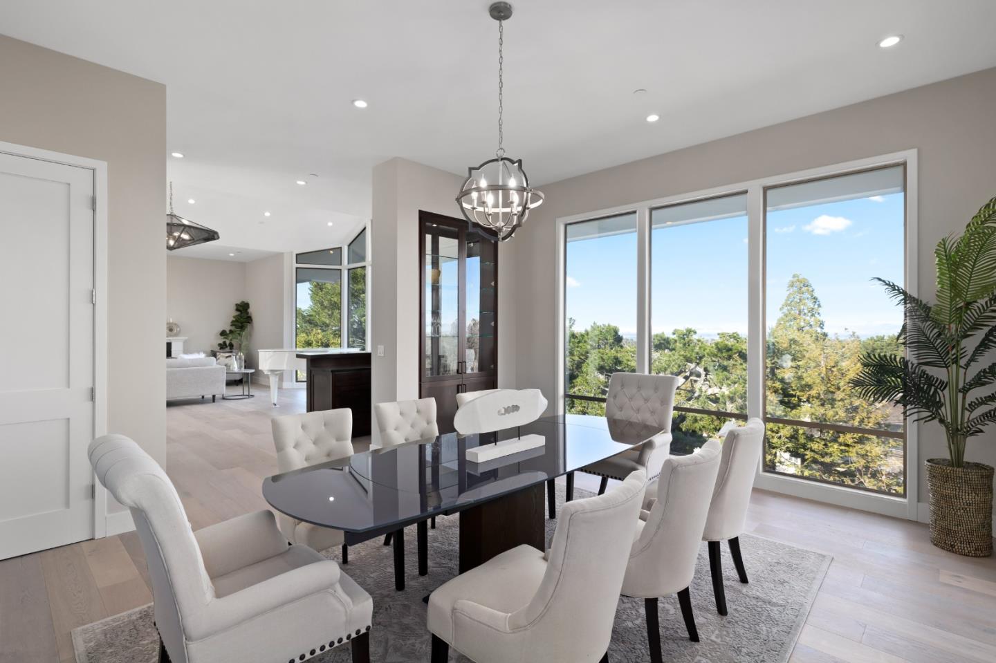 245 Eucalyptus Avenue Hillsborough, CA 94010 - Photo 5 of 27 a view of a dining room with furniture window and outside view