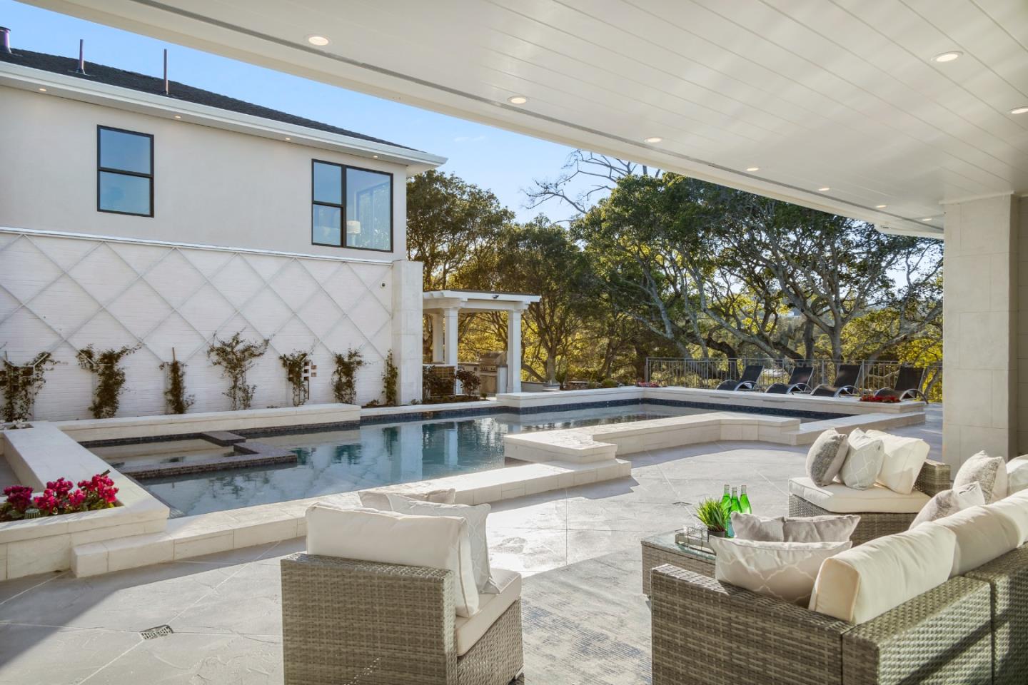 245 Eucalyptus Avenue Hillsborough, CA 94010 - Photo 9 of 27 a living room with furniture and a potted plant