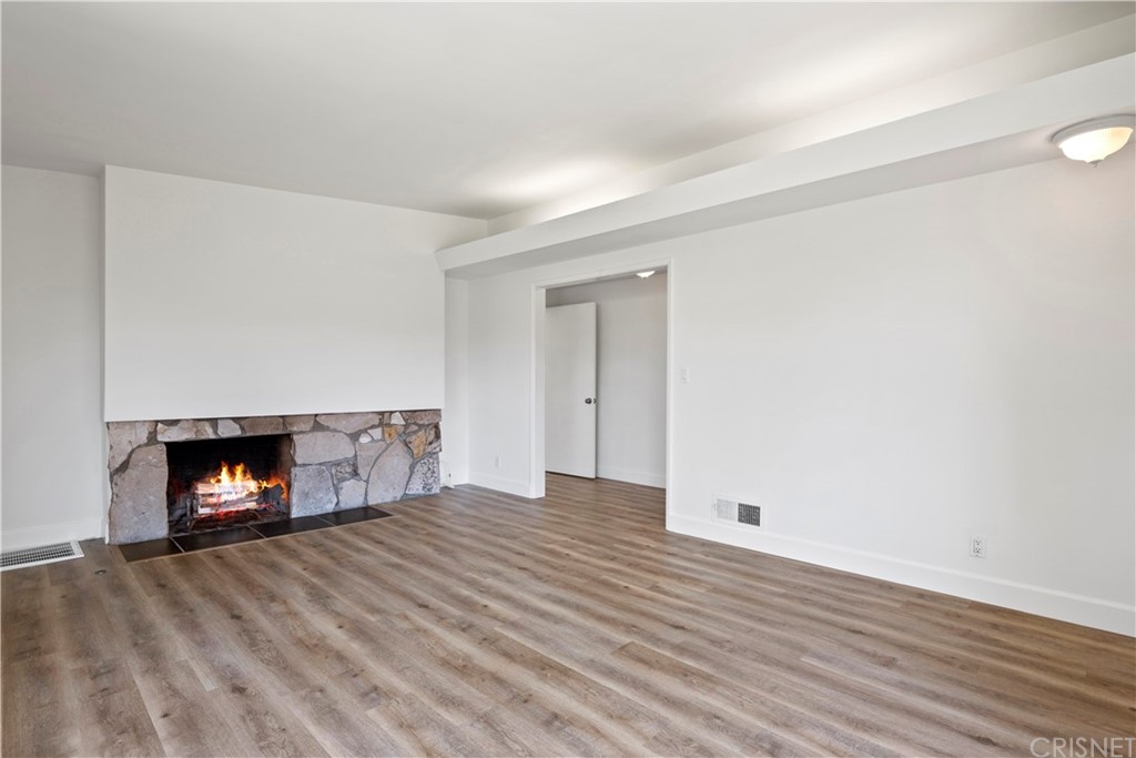 3653 El Caminito La Crescenta, CA 91214 - Photo 24 of 75 a view of an empty room with a fireplace and a window