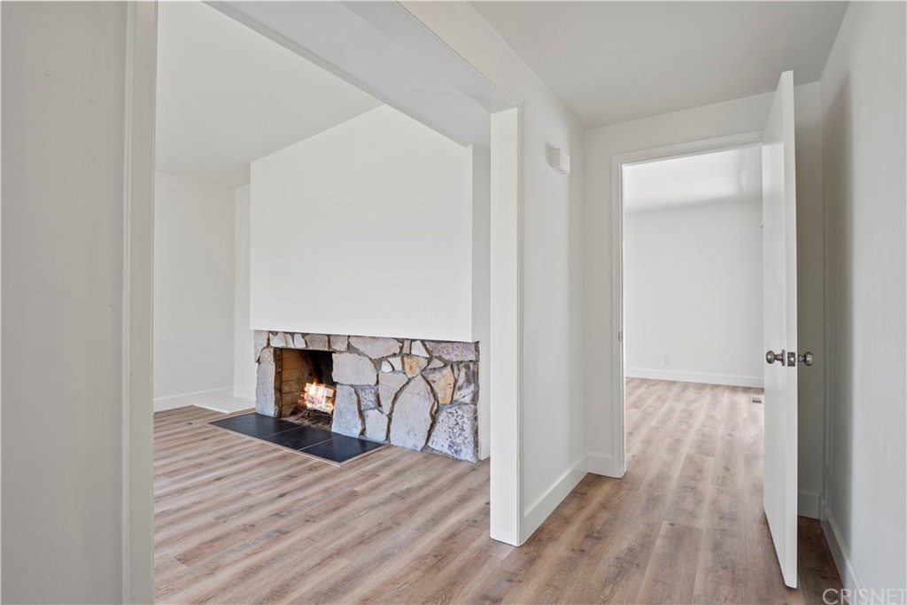 3653 El Caminito La Crescenta, CA 91214 - Photo 27 of 75 a view of a room that has a bed and wooden floor