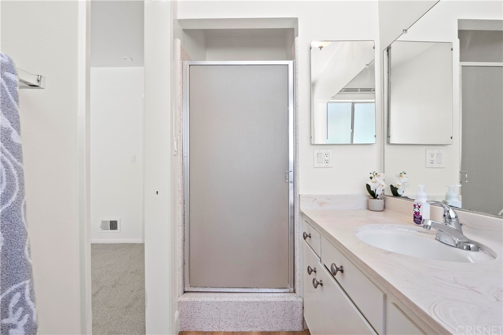 3653 El Caminito La Crescenta, CA 91214 - Photo 41 of 75 a bathroom with a double vanity sink and a mirror