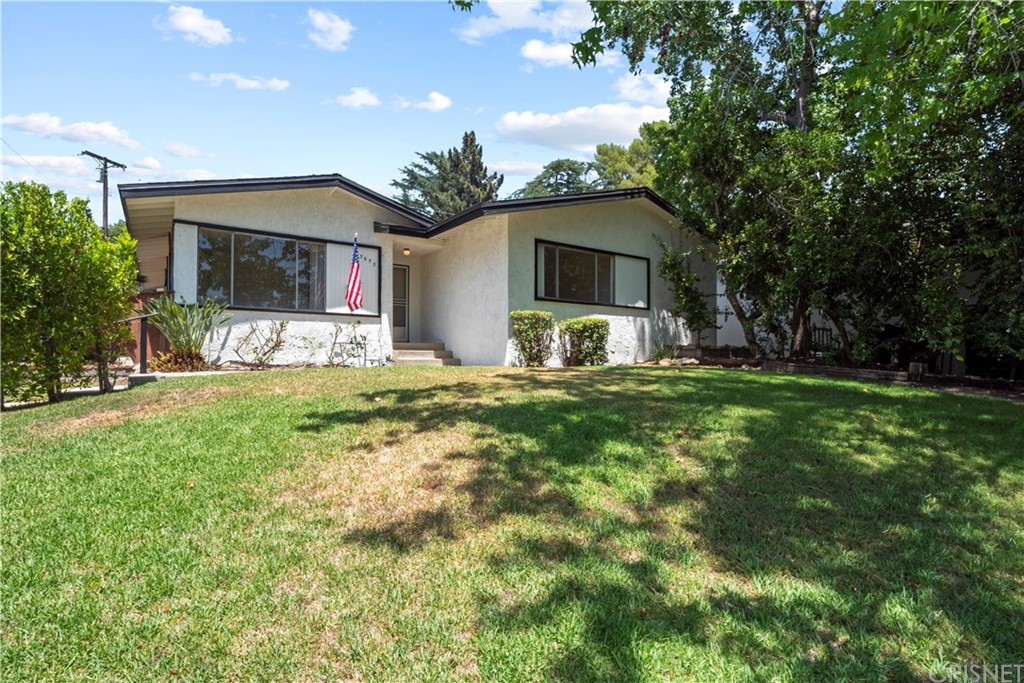 3653 El Caminito La Crescenta, CA 91214 - Photo 60 of 75 a front view of a house with a yard and garage