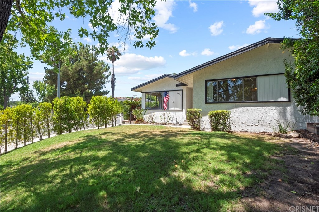 3653 El Caminito La Crescenta, CA 91214 - Photo 61 of 75 a front view of a house with a yard and garage