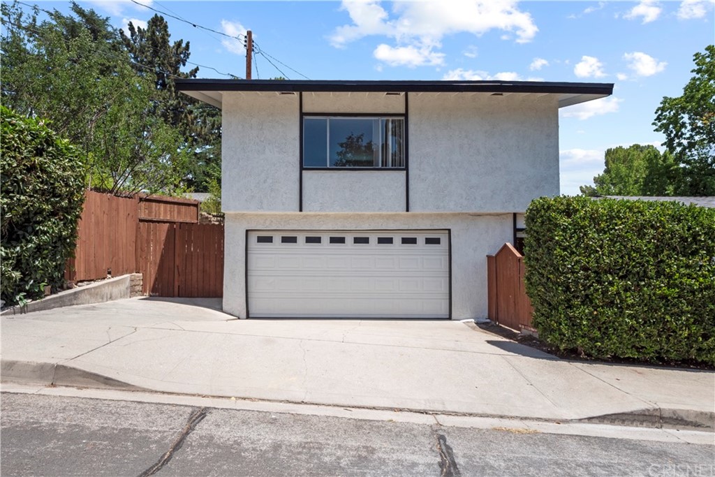 3653 El Caminito La Crescenta, CA 91214 - Photo 64 of 75 front view of a house with a garage