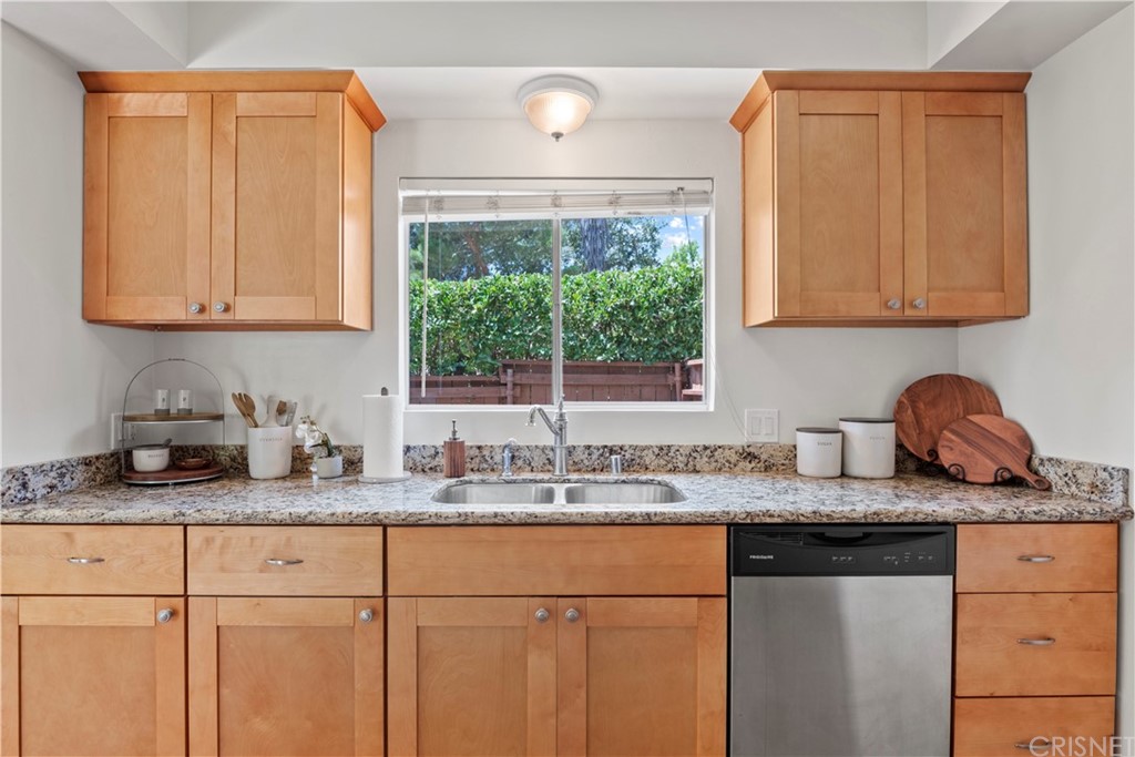 3653 El Caminito La Crescenta, CA 91214 - Photo 9 of 75 a kitchen with granite countertop cabinets sink and window