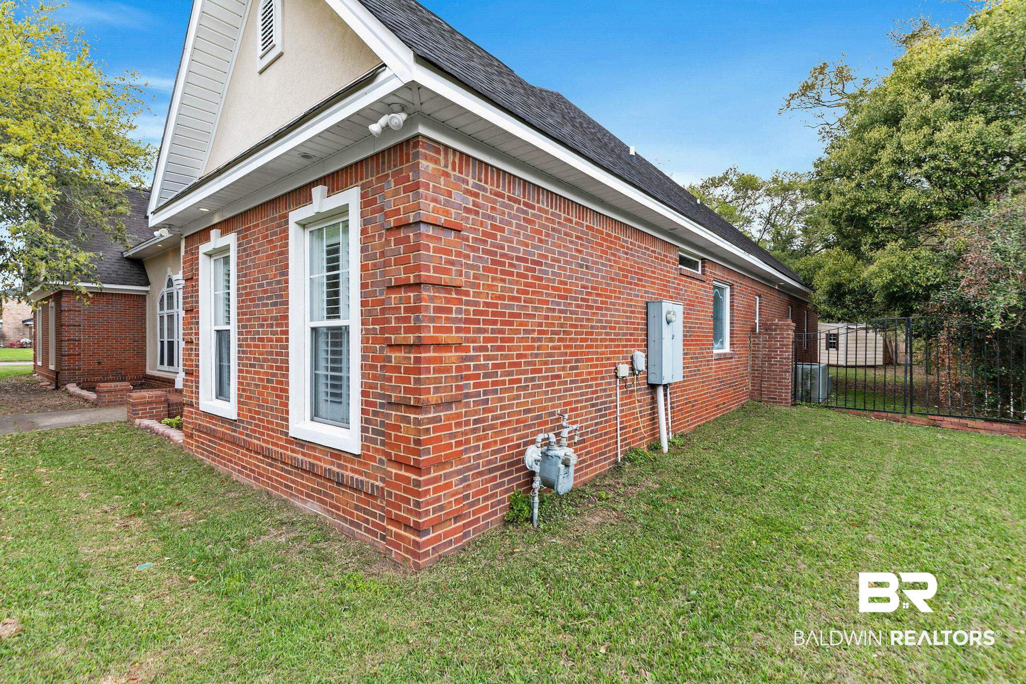 3668 Claridge Road North Mobile, AL 36608 - Photo 84 of 100 View of property exterior with brick siding and a shingled roof