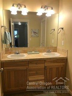 61241 Splendor Lane Bend, OR 97702 - Photo 15 of 25 Upstairs hall bath; toilet and shower in
