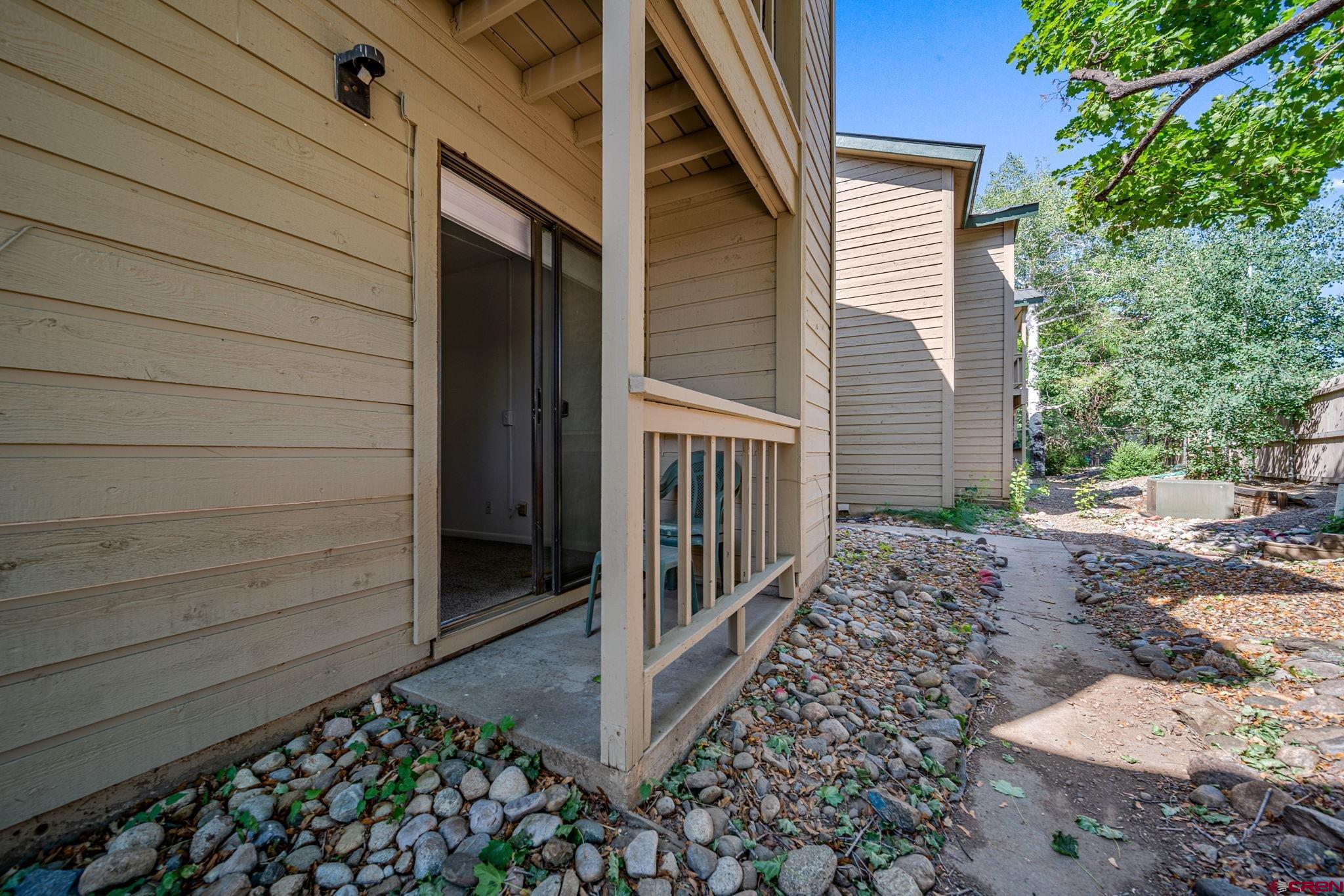 1200 Florida Road, Unit 11 Durango, CO 81301 - Photo 14 of 19 a view of a house with a yard