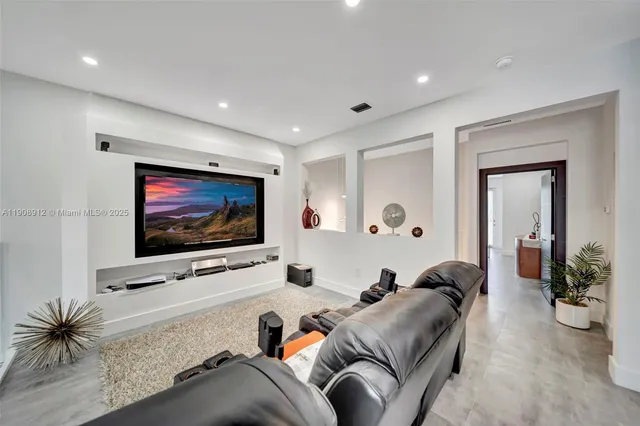 a bathroom with a double vanity sink mirror and shower