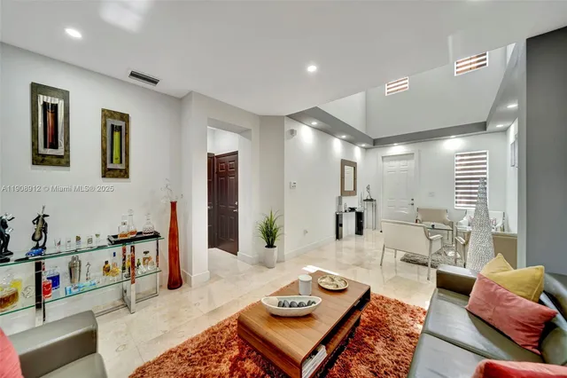 a workspace with furniture and potted plant