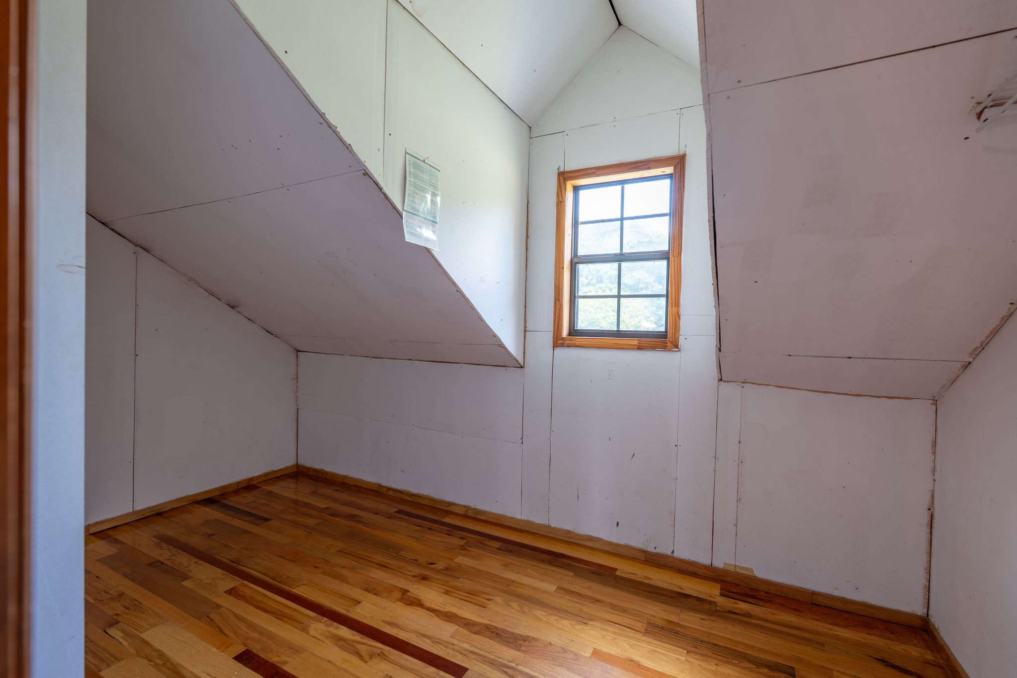 1919 Bear Creek Road Collinwood, TN 38450 - Photo 23 of 29 a view of a room with wooden floor and staircase