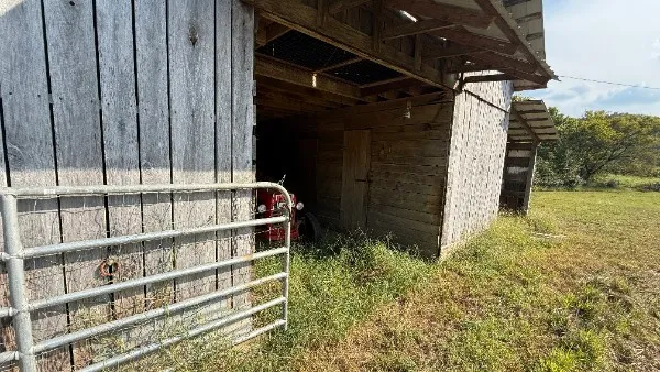 a view of a lake with a yard