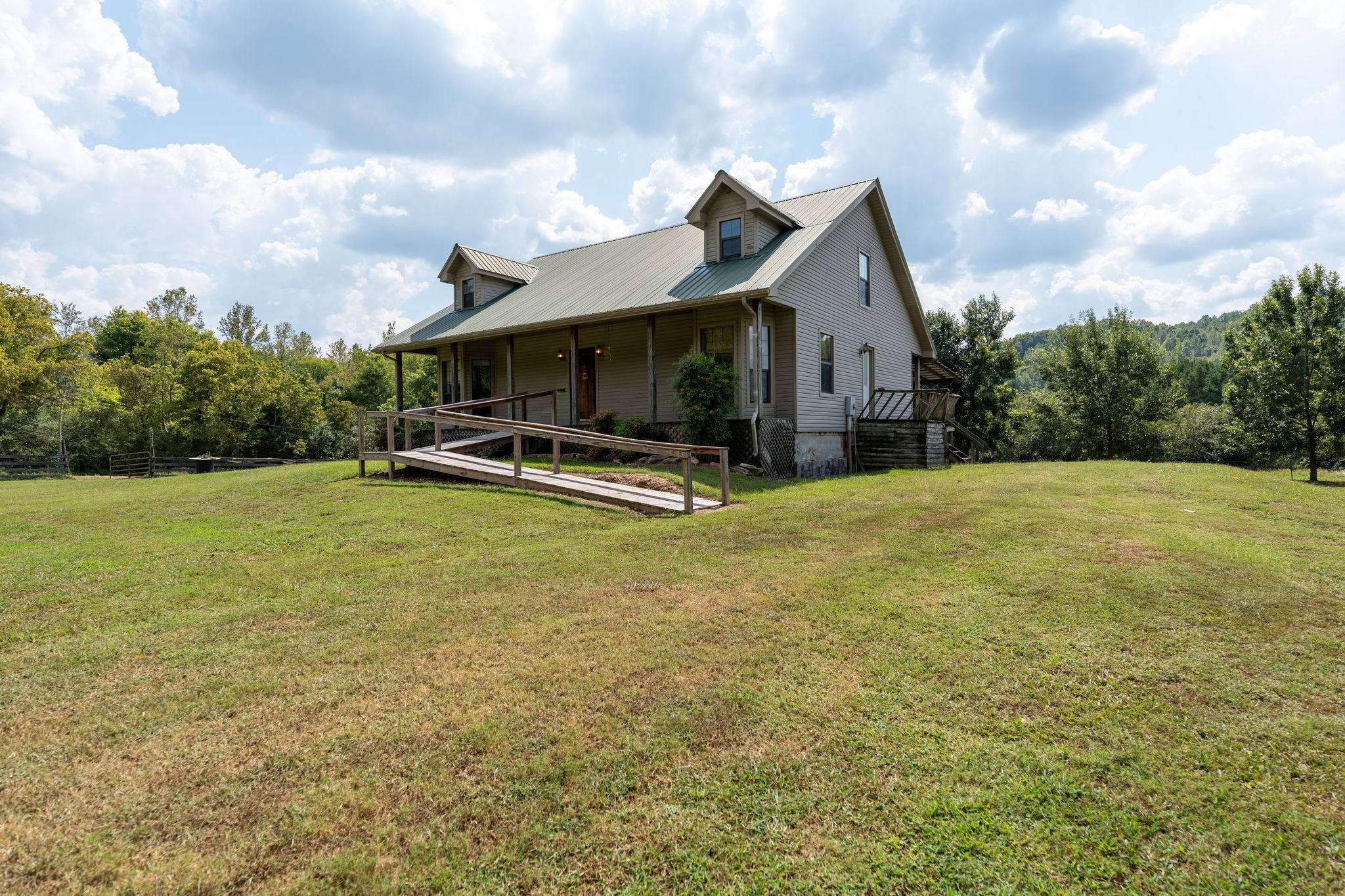1919 Bear Creek Road Collinwood, TN 38450 - Photo 4 of 29 a front view of house with yard and entertaining space